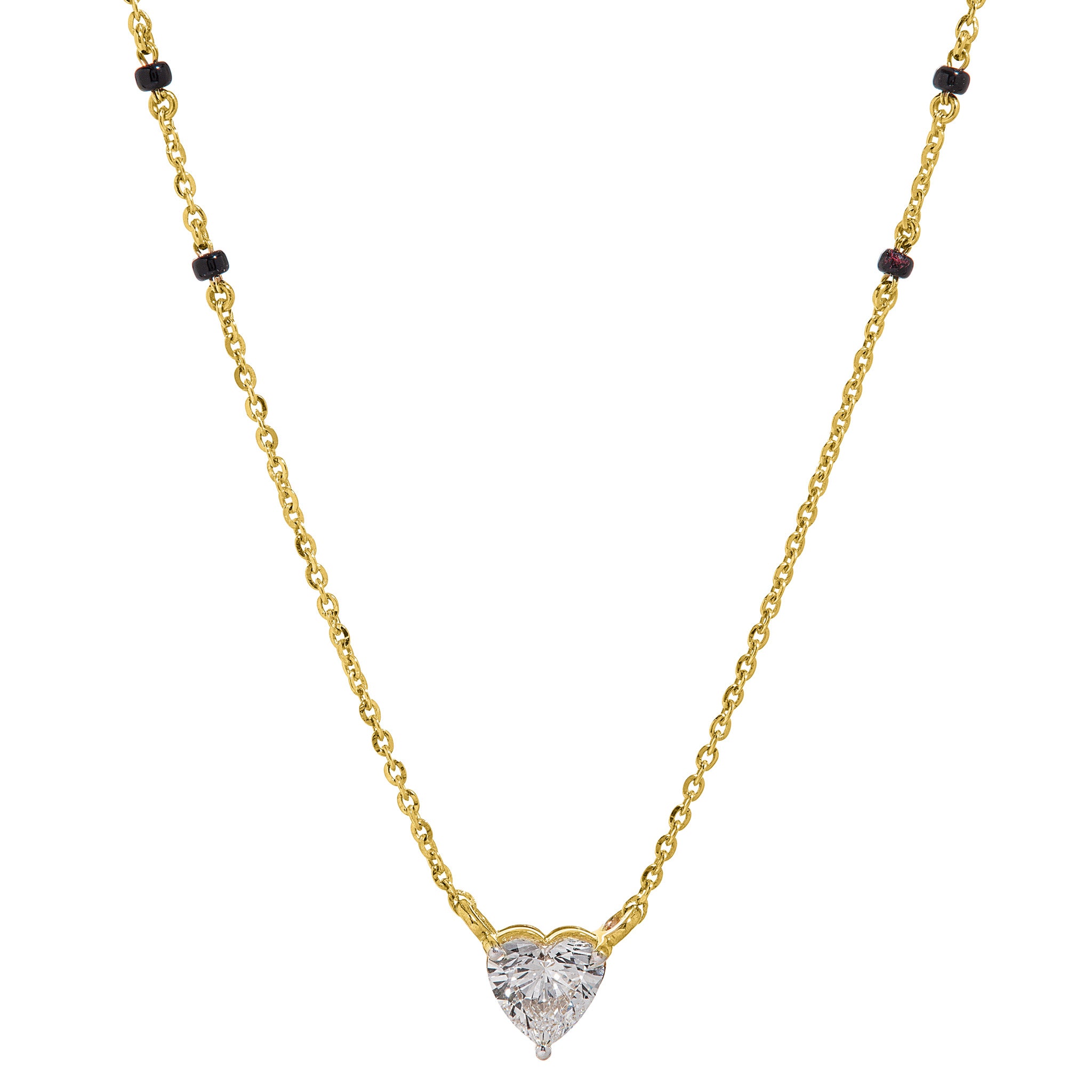 Close-up of heart-shaped lab-grown diamond pendant on The Forever mangalsutra necklace, 18k gold chain with black beads on white background