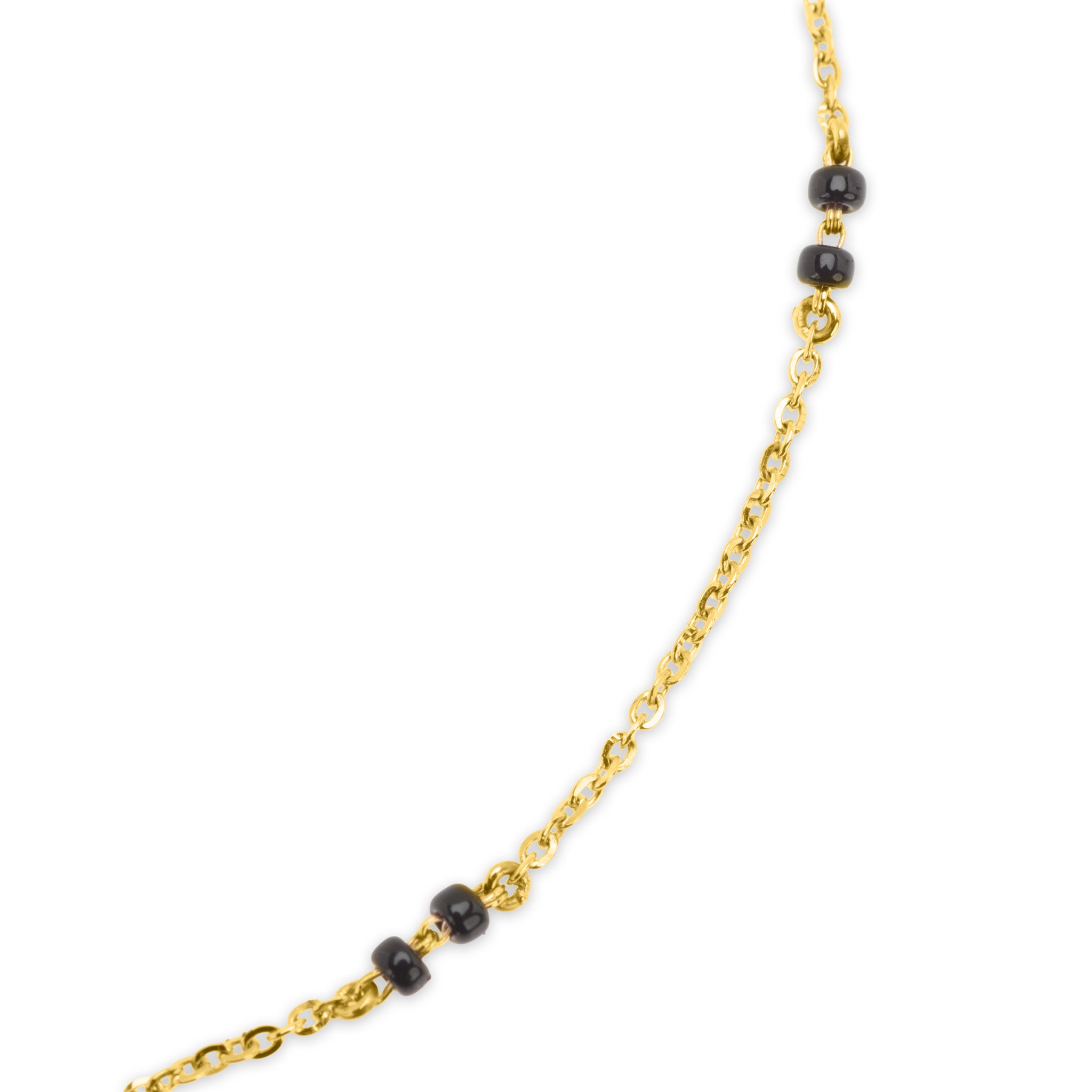 Detail of 18k gold cable chain with black bead accents on The Promise mangalsutra necklace, on white background.