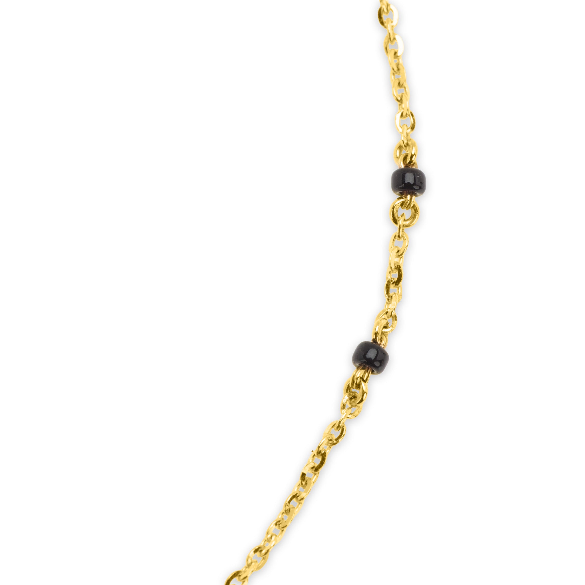 Detail of 18k gold cable chain with black bead accents on The Forever mangalsutra necklace, on white background."