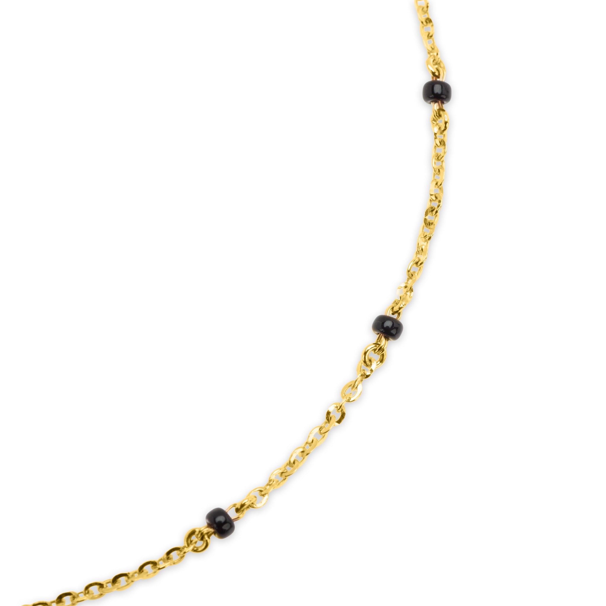Detail of 18k gold cable chain with black bead accents on The Legacy mangalsutra necklace, on white background